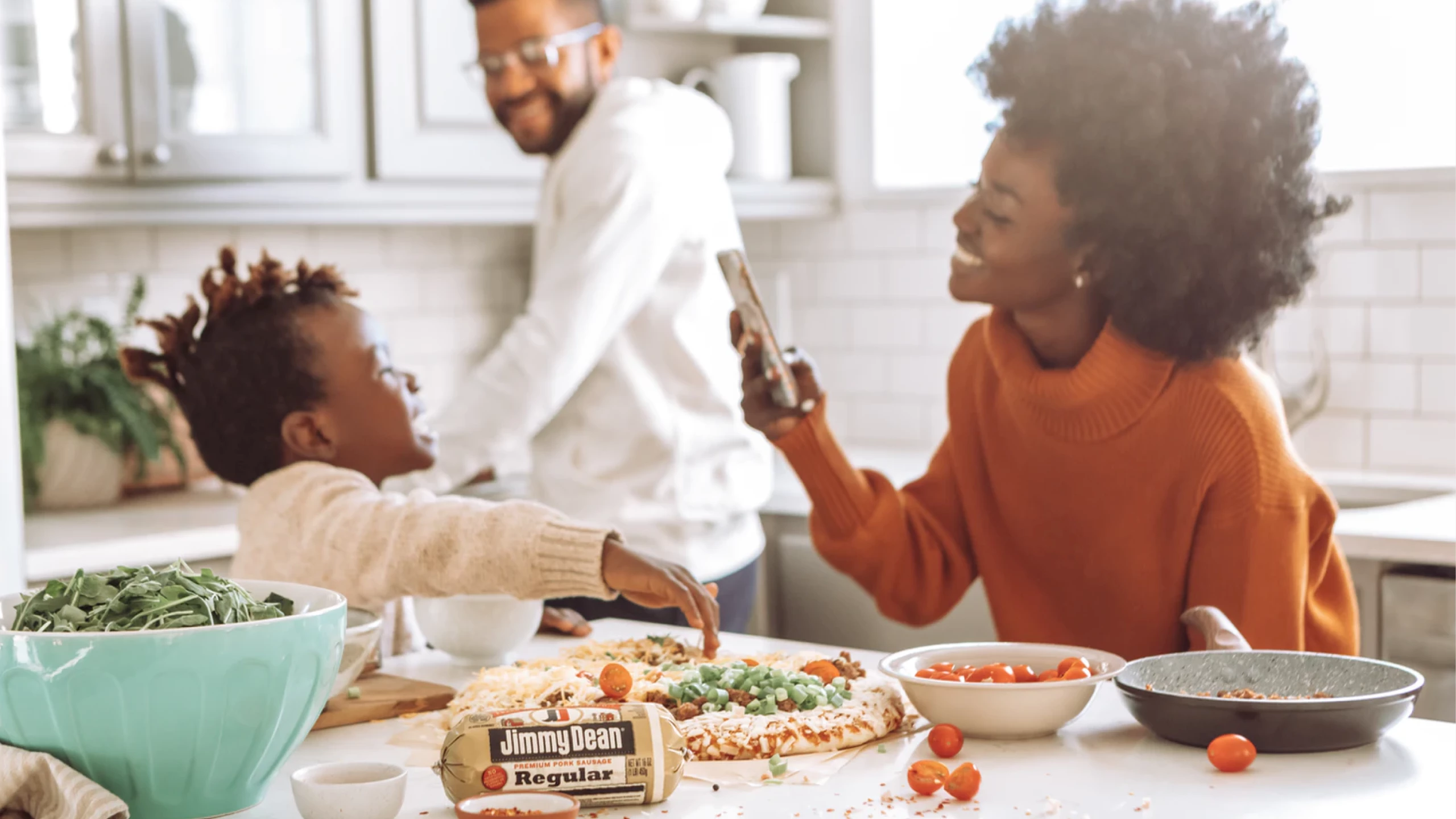 Family making gluten-free pizza