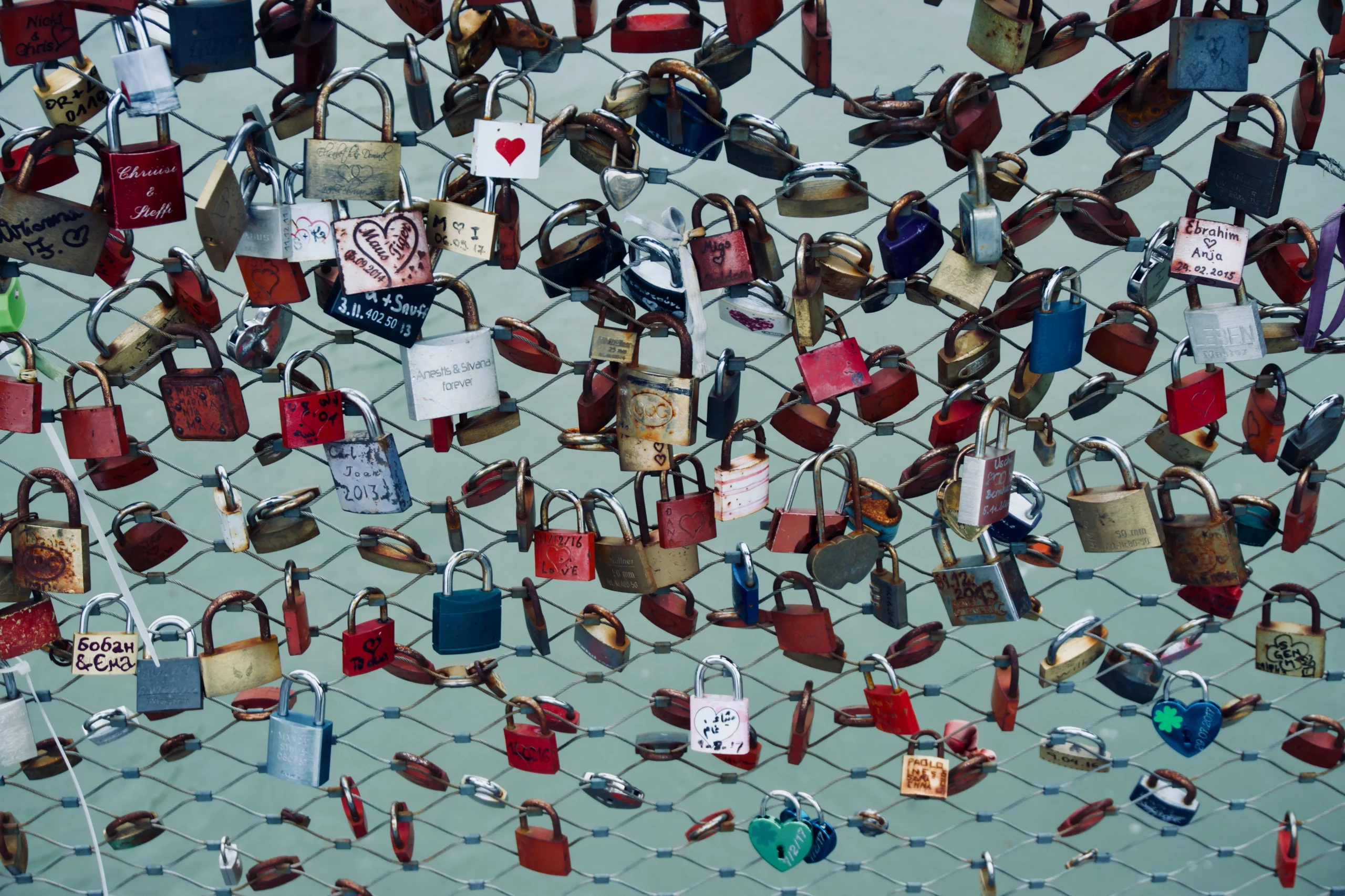 padlocks attached to bridge